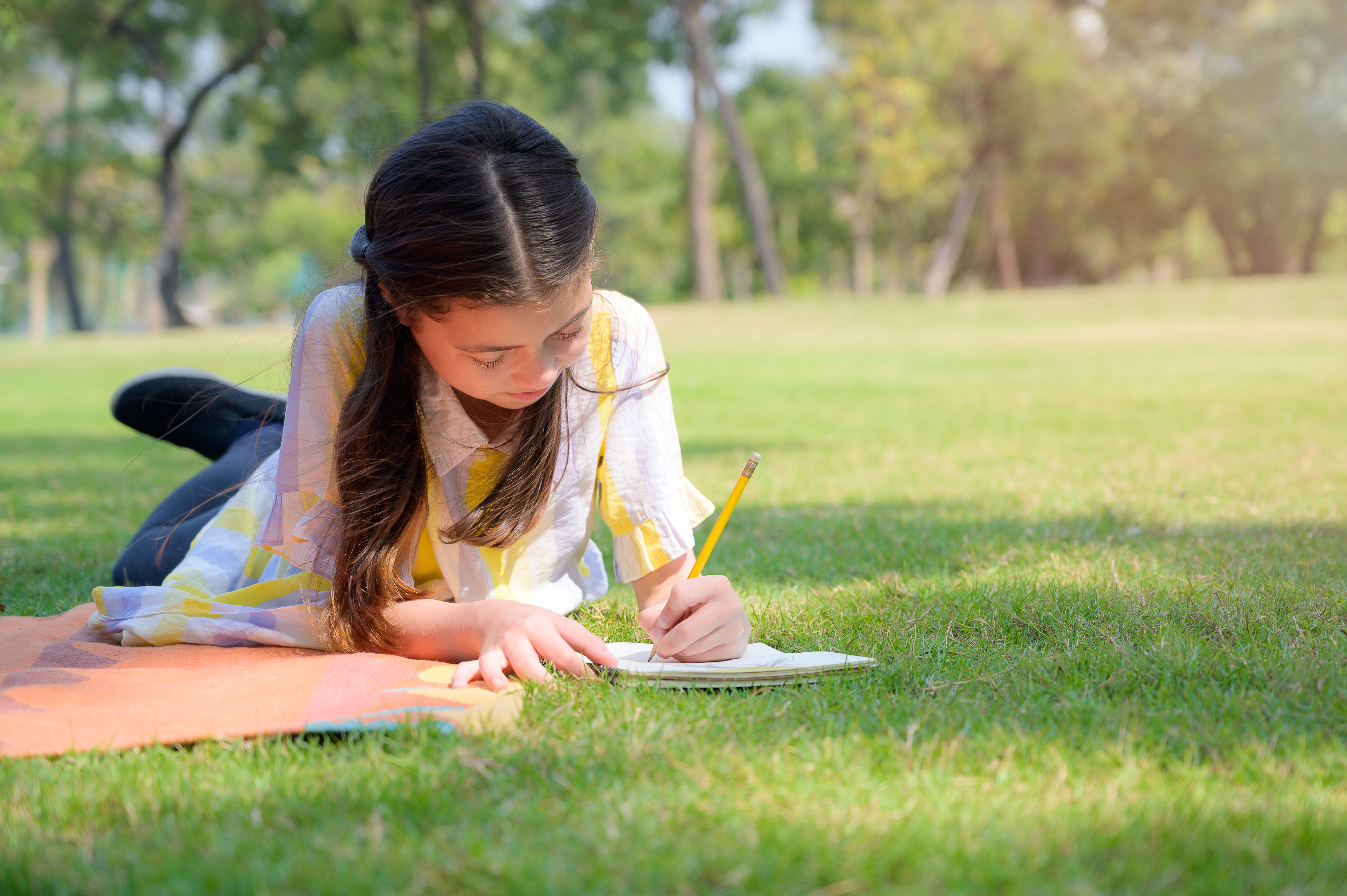 Kids writing and drawing